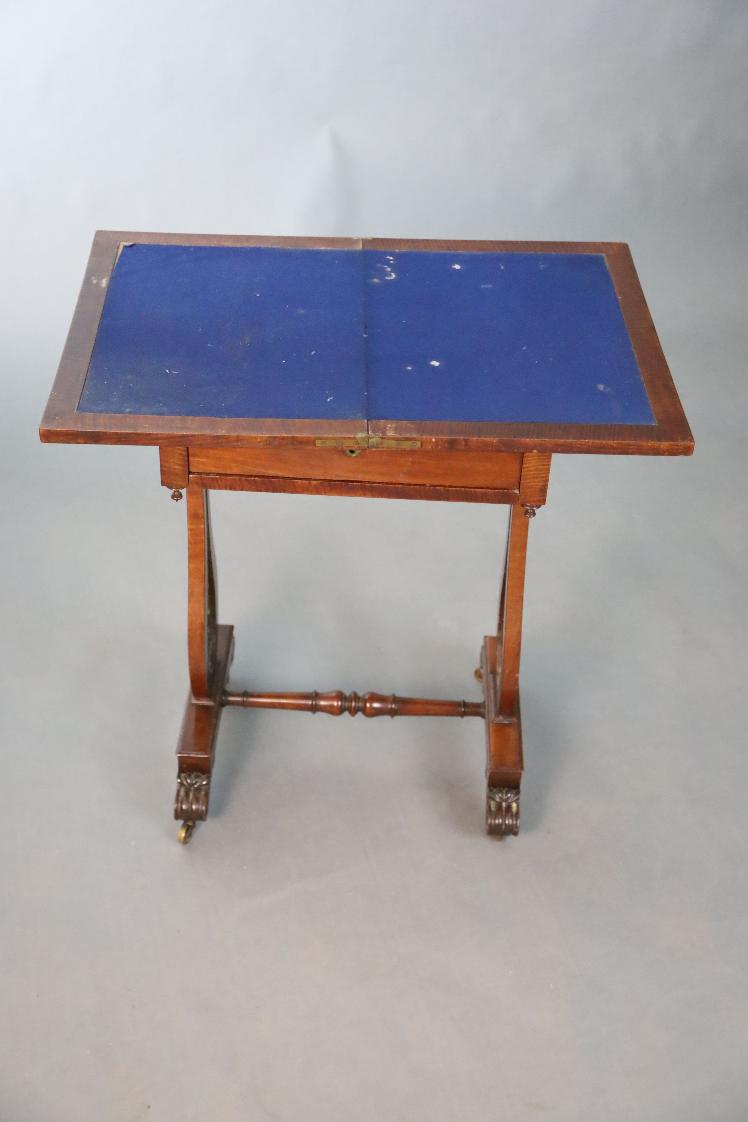 An early Victorian mahogany games / work table, W.53.5cm D.38cm H.76.5cm